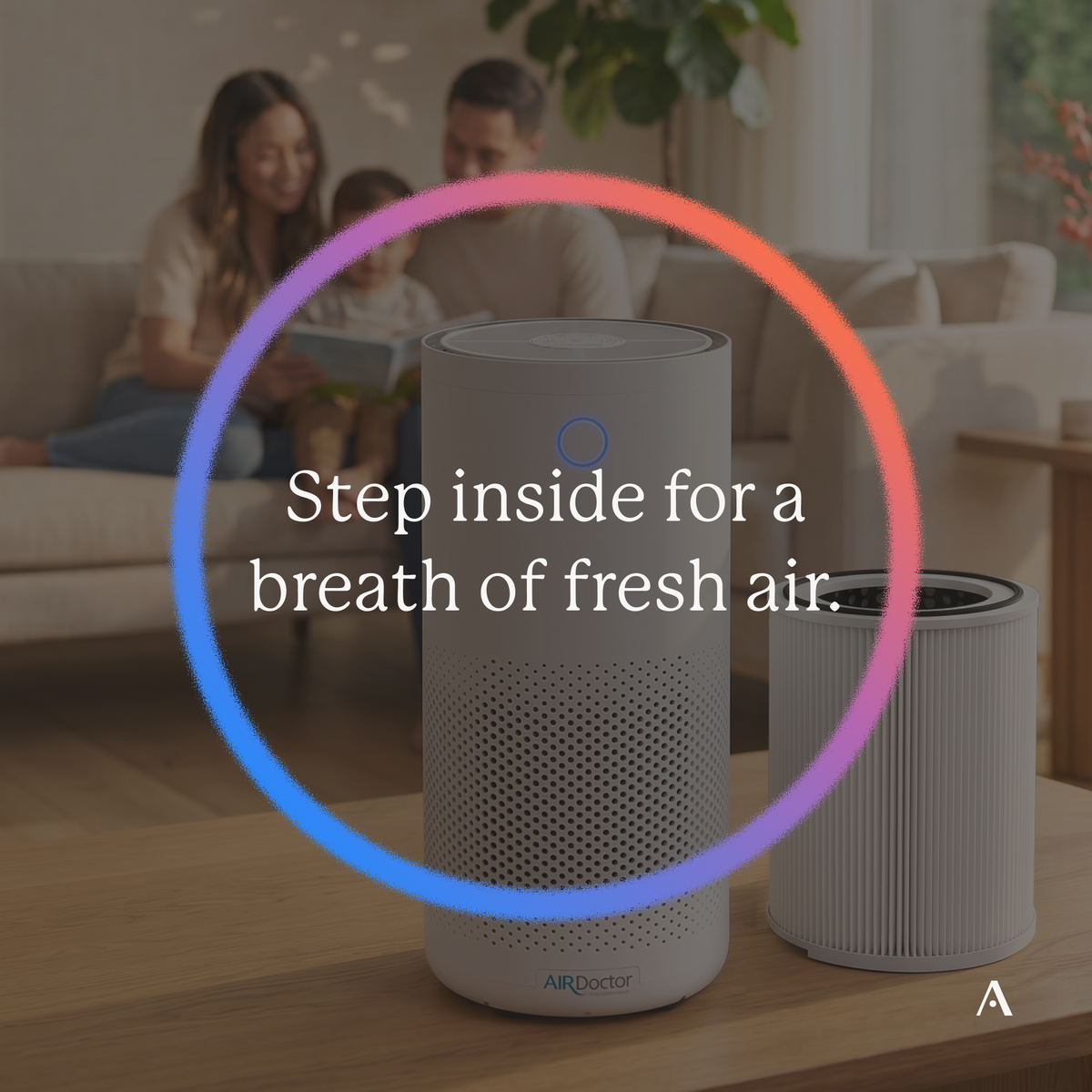 AirDoctor 4000 purifier and cylindrical filter with a family in the background